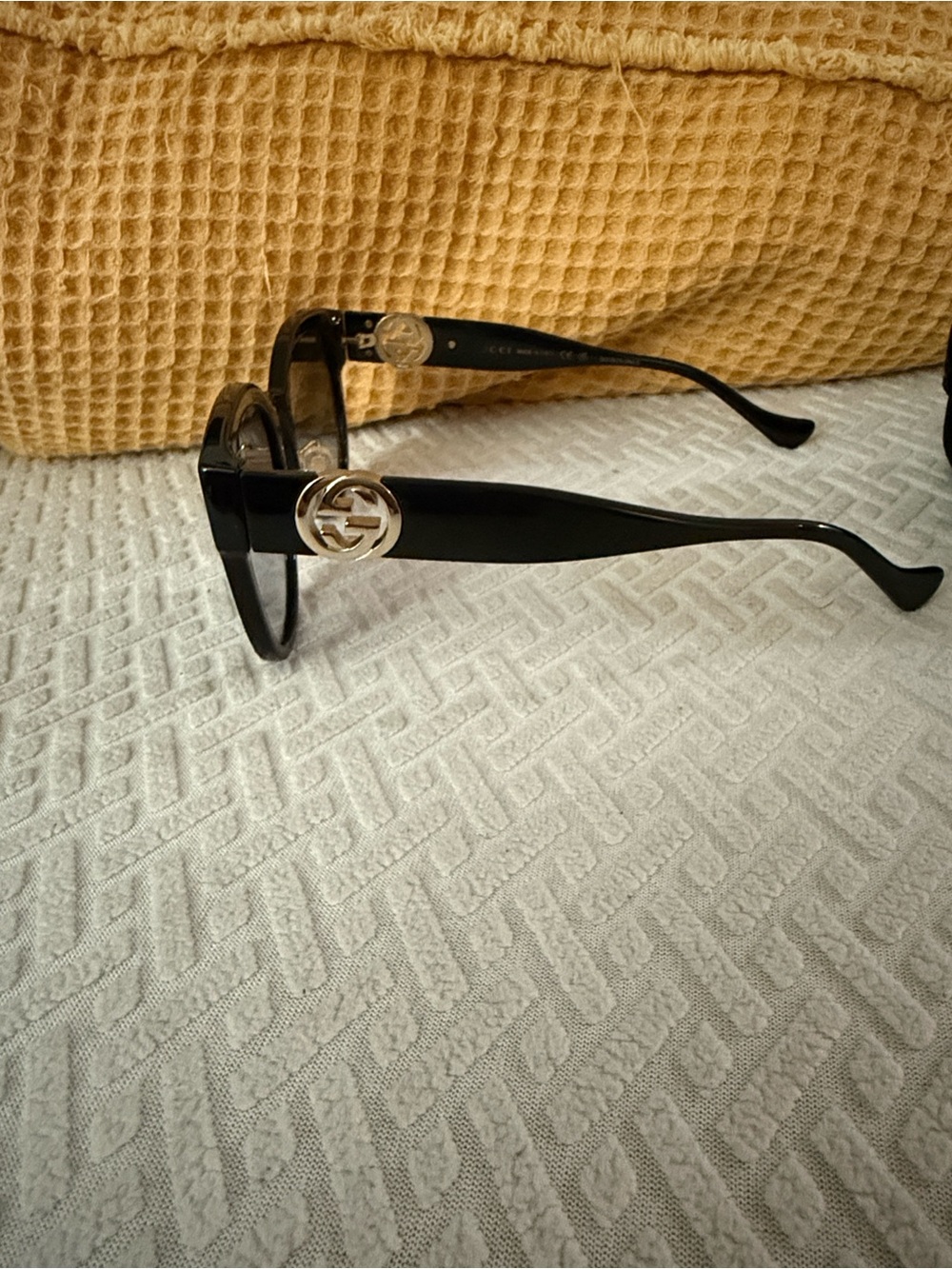 Gucci Glossy Black Round Sunglasses with Silver GG Emblem